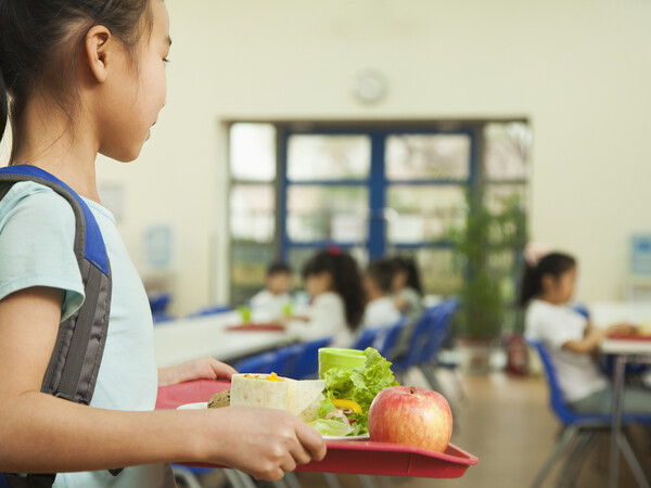 Child in school cafeteria